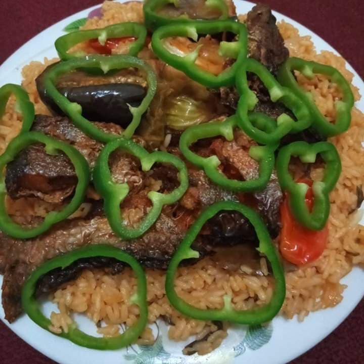 Riz gras rouge au poisson : recette africaine