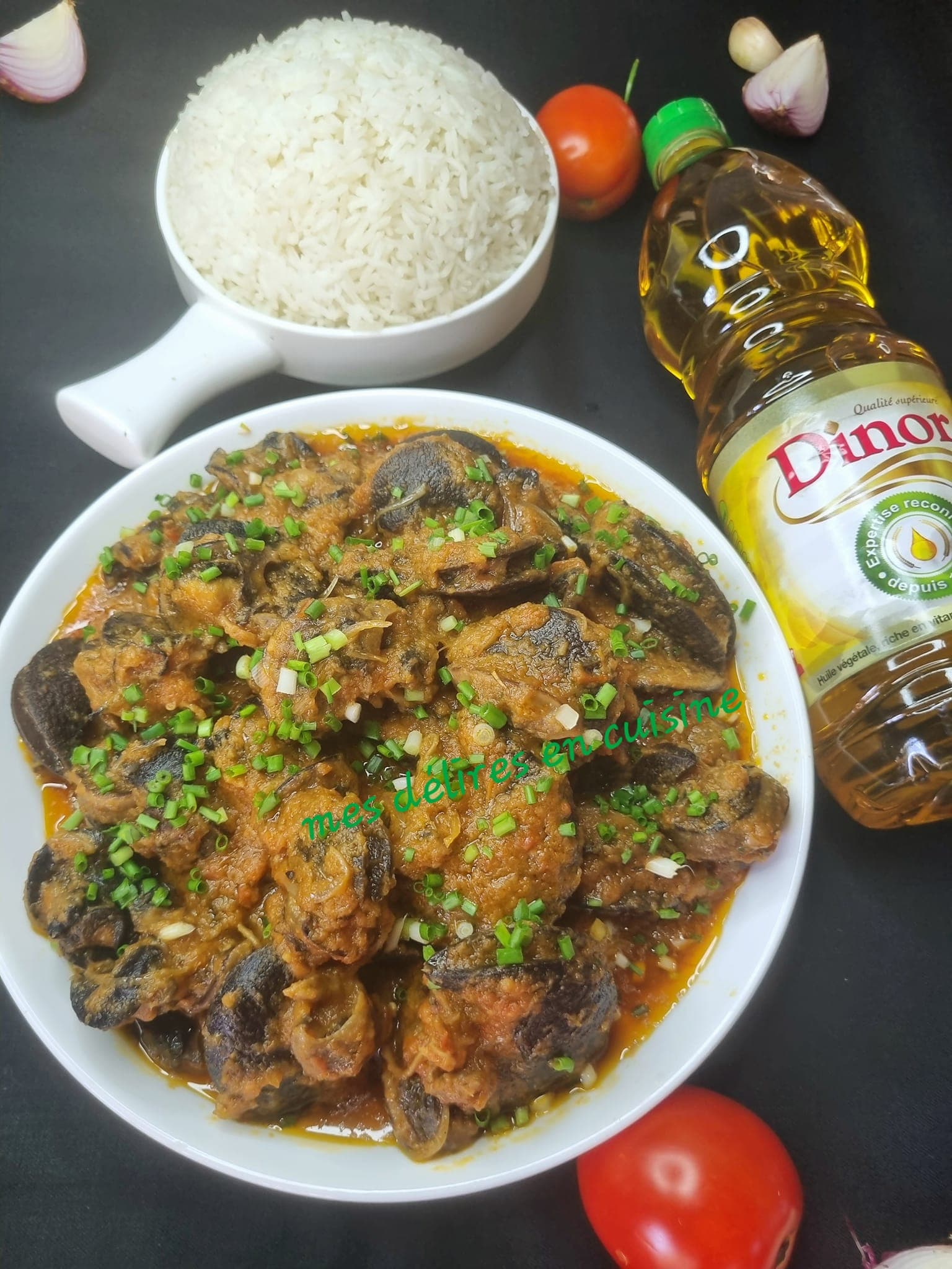 Escargots sautés à la tomate : recette africaine