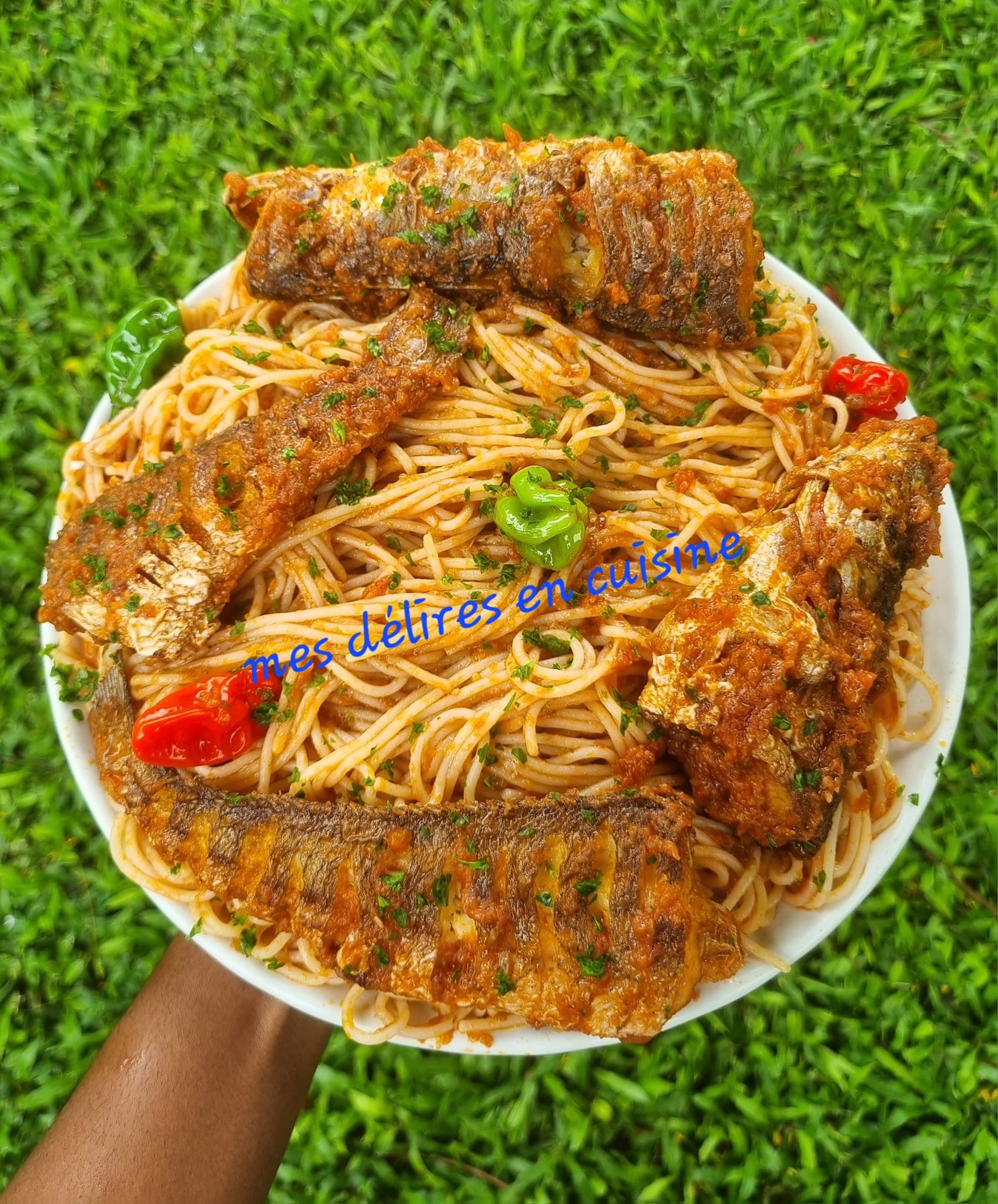 Spaghetti sauté au poisson frit : recette fusion