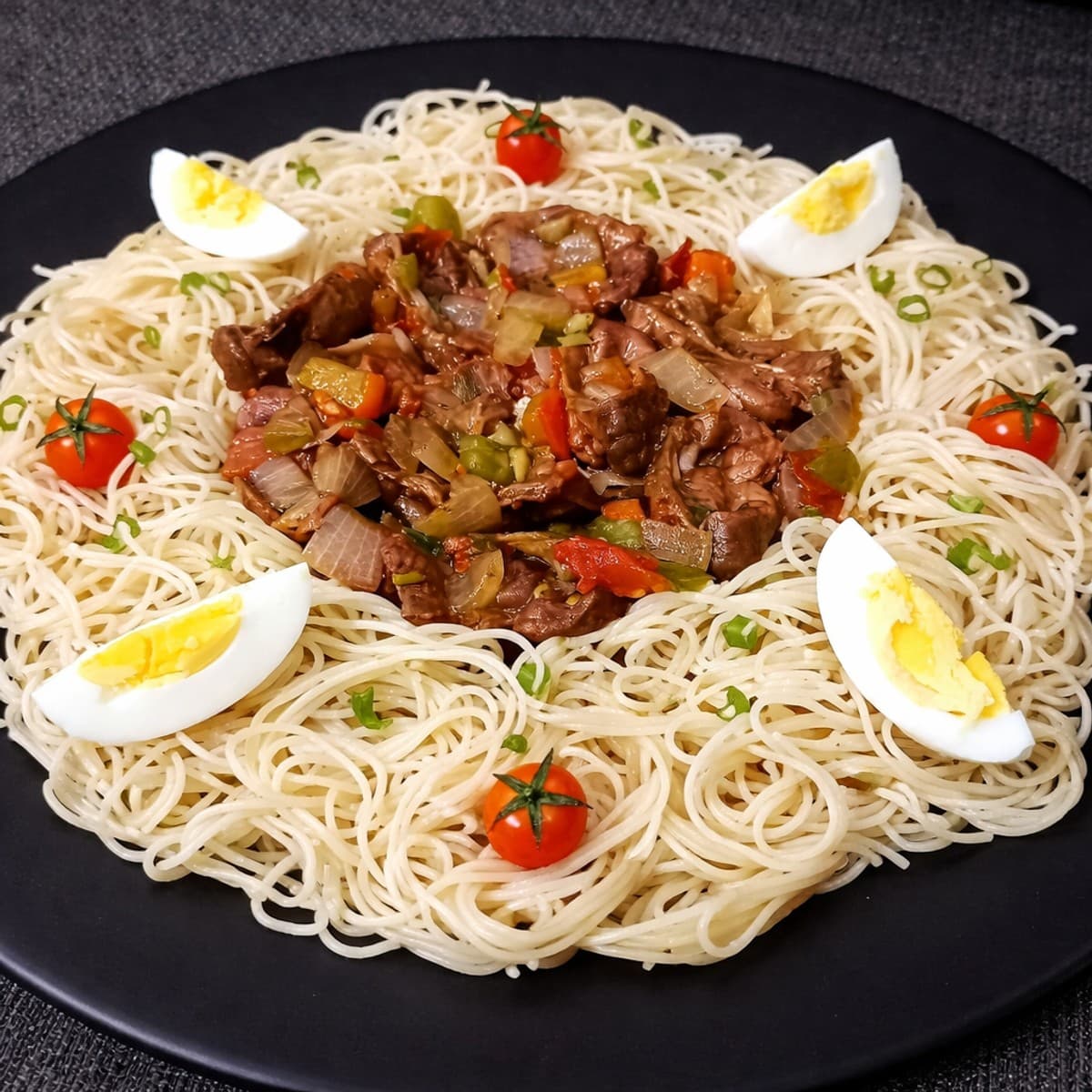Gésiers aux légumes entourés de son nid de spaghettis