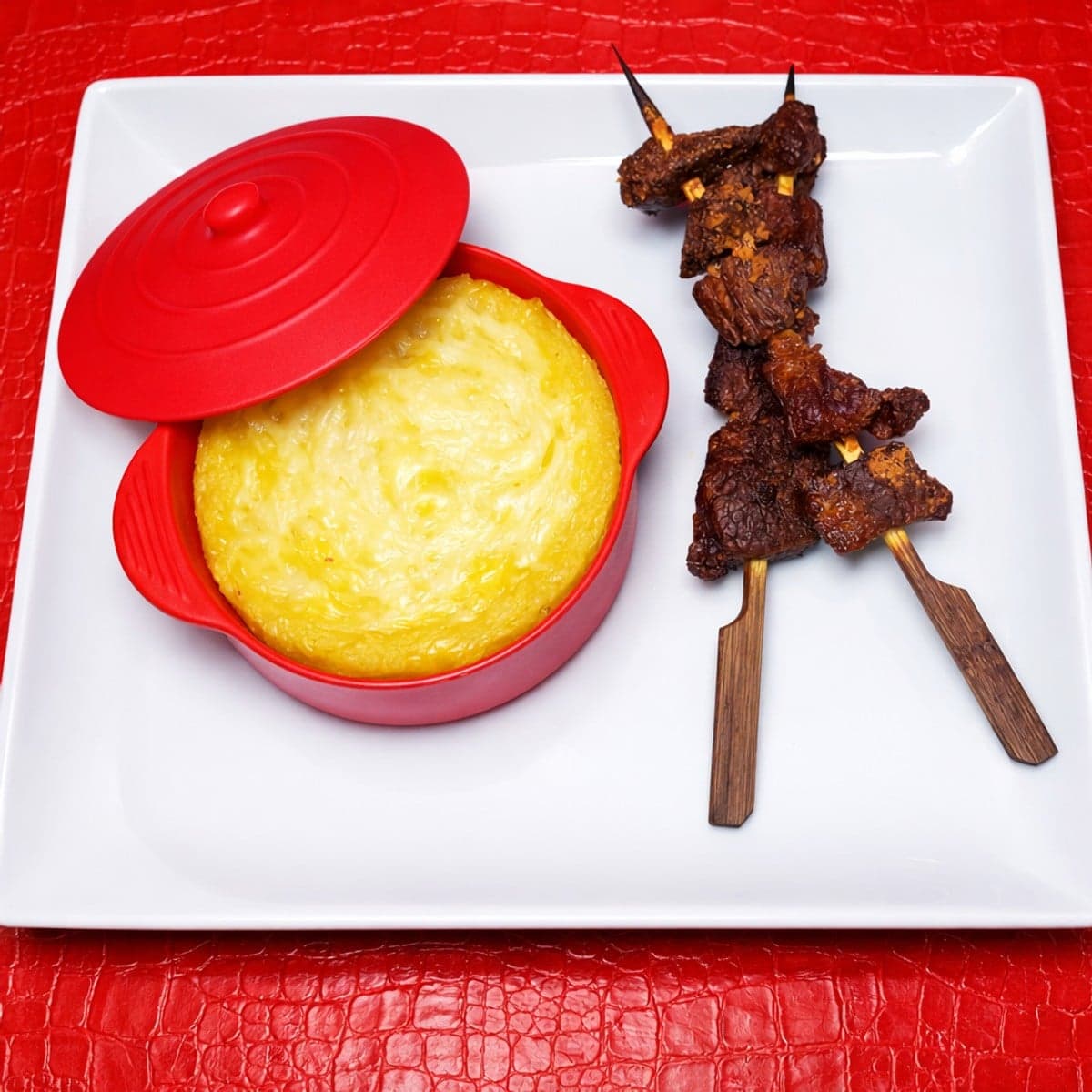 Parmentier de canard et brochette de veau