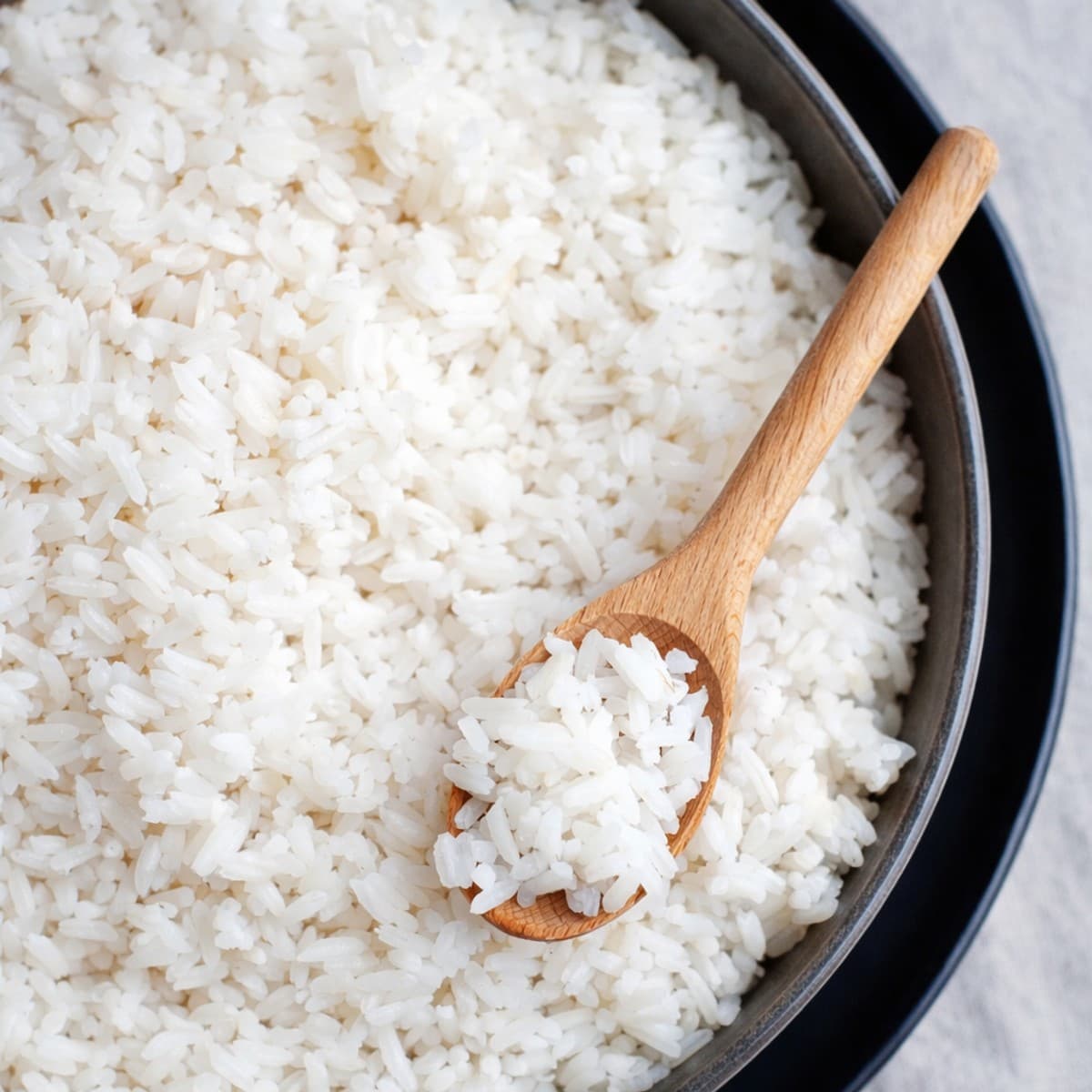 Est-il important de laver le riz avant cuisson?