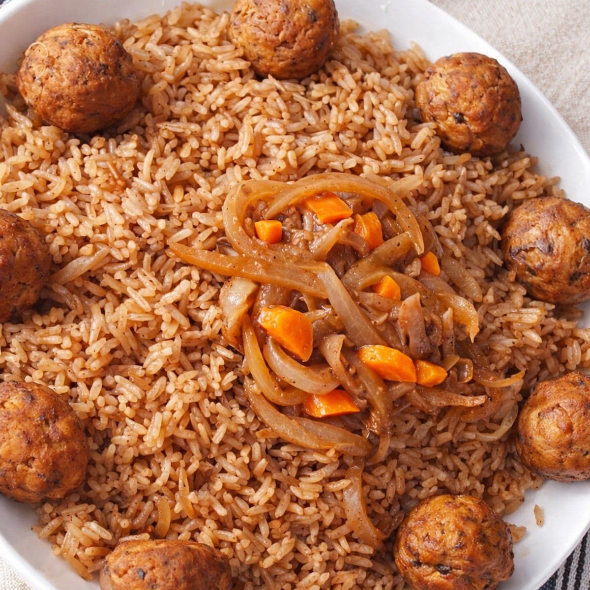 Riz gras aux boulettes de poisson
