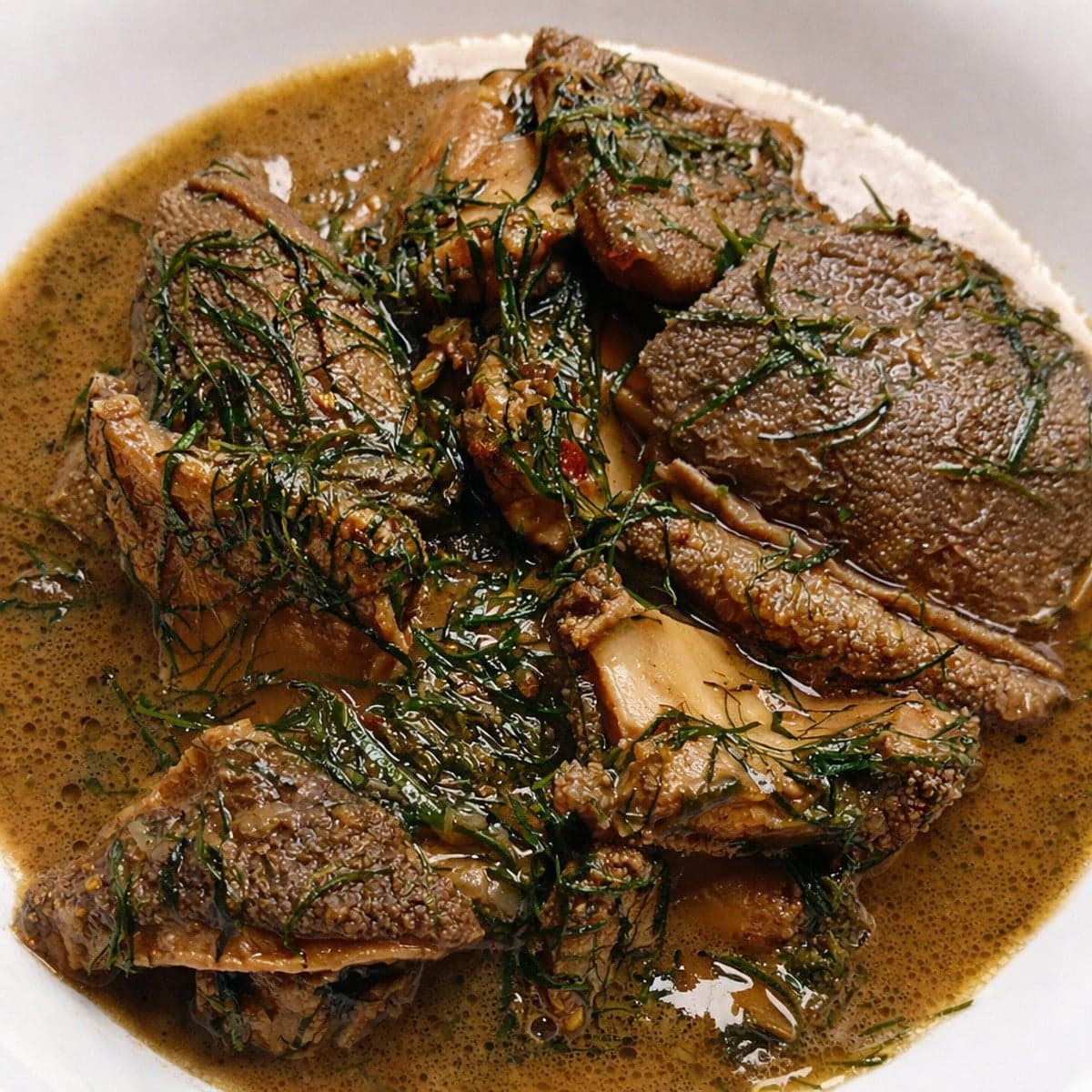 3pièces ou fumbwa (Tripes de boeuf à la pâte d’arachide)
