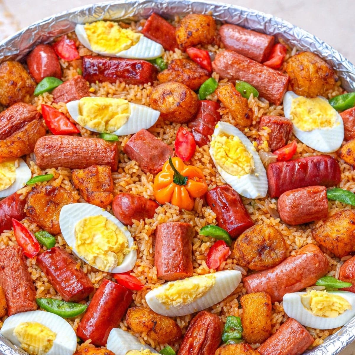 Riz saucisses œufs beignets : recette