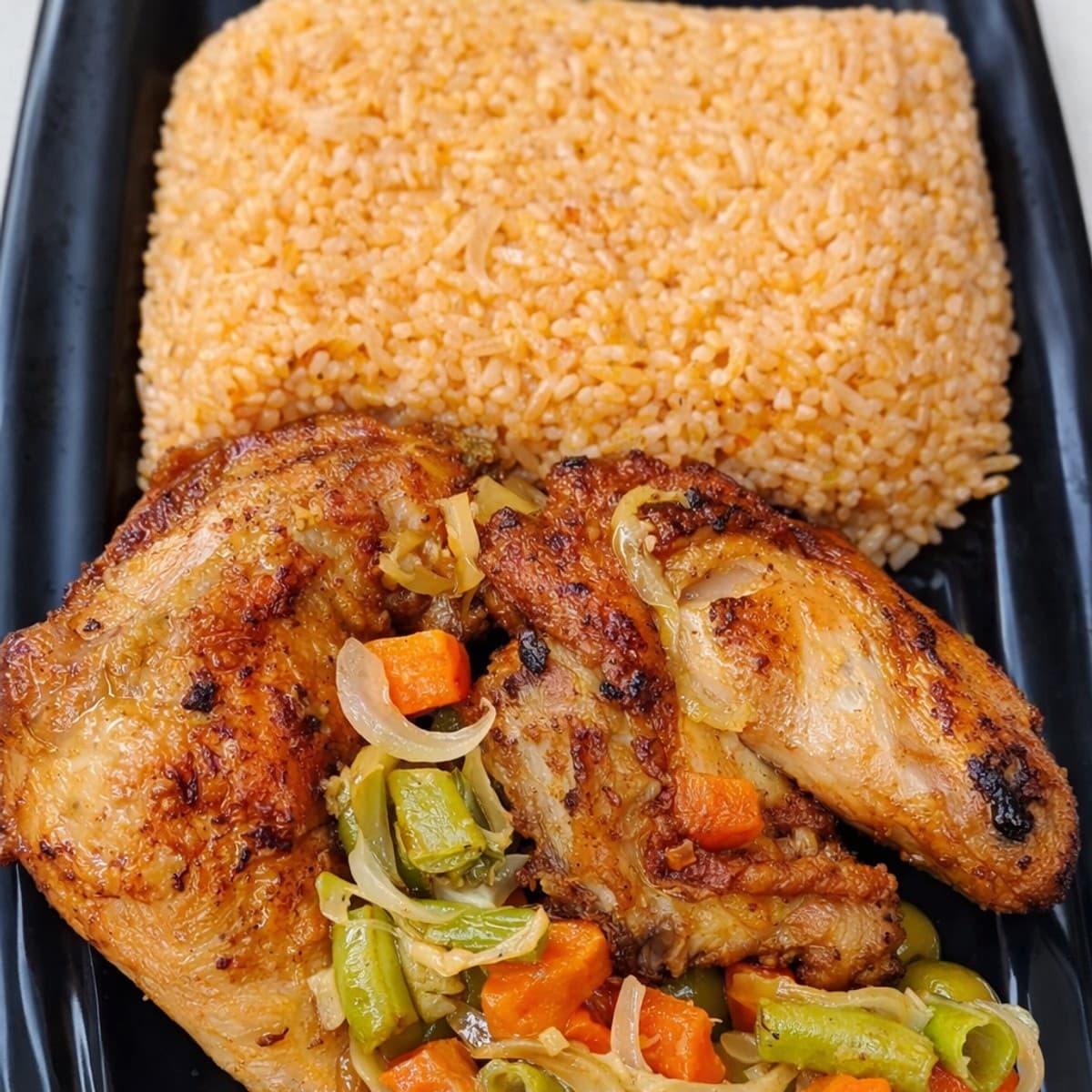 Riz gras au poulet du soir : recette africaine