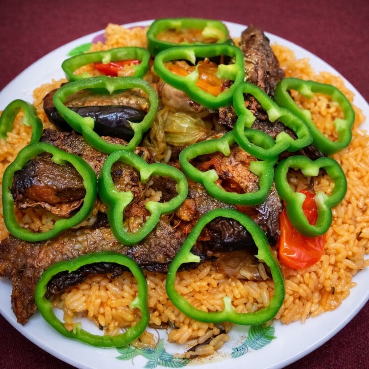 Riz gras rouge au poisson : recette africaine