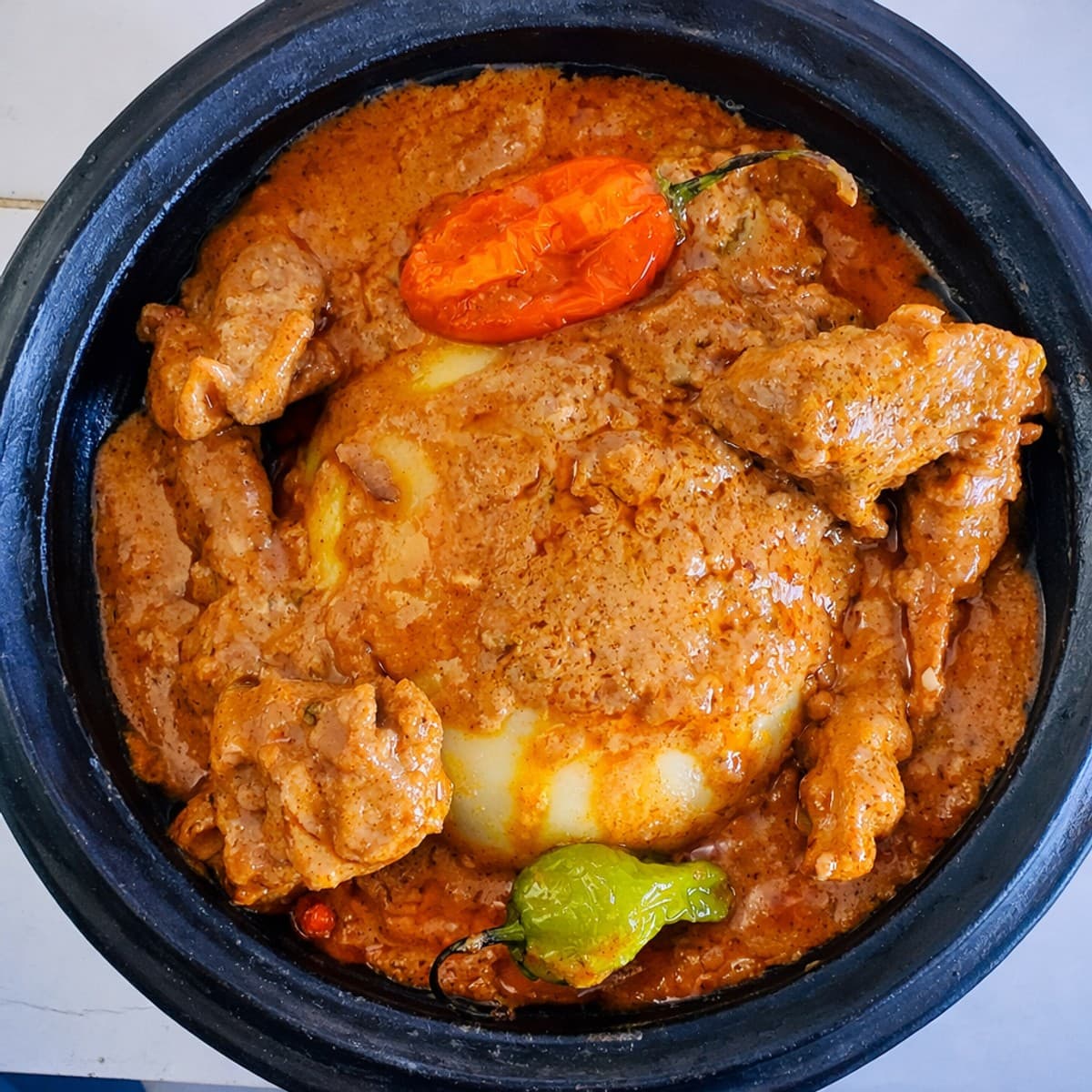 Sauce arachide viande de mouton foutou d’igname