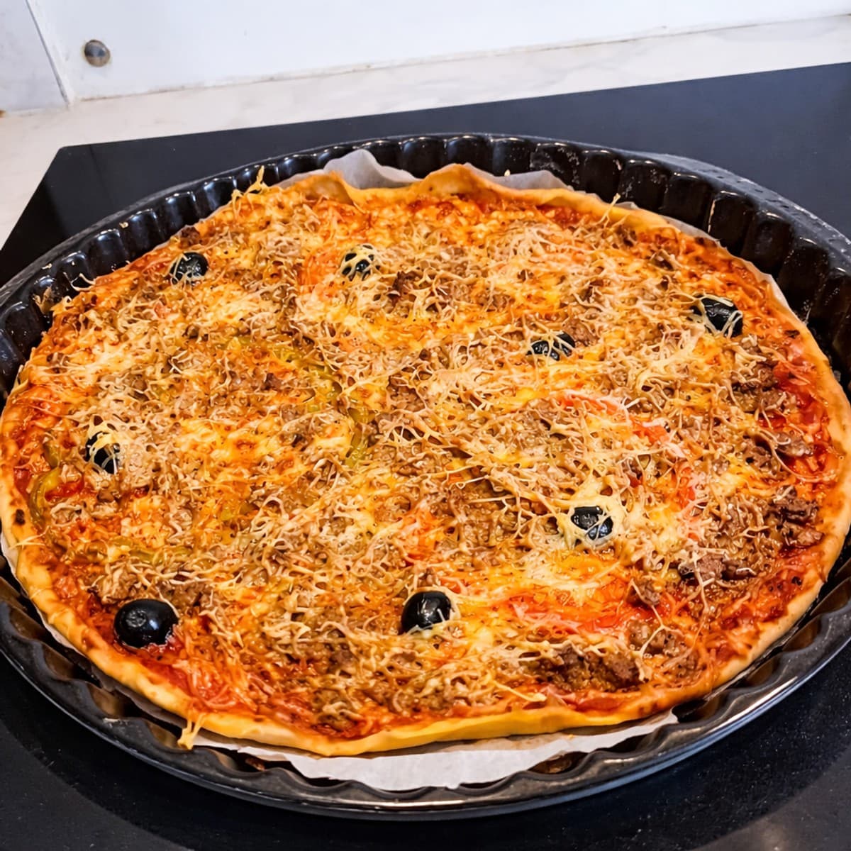 Pizza à la viande hachée : recette gourmande