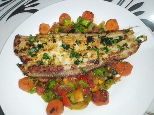 Poisson sole sur son lit de légumes.